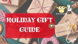 Text: "Holiday Gift Guide" with packages and YellowWebMonkey logo